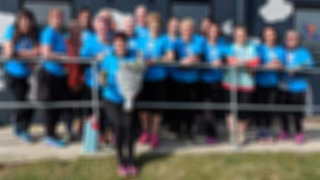 Kim and group.jpg blurred out