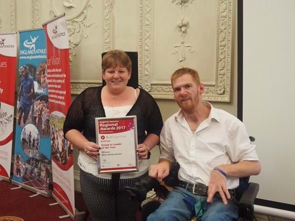 Wednesday winner- Christine with guest speake rPara Athlete Stephen Miller.jpg