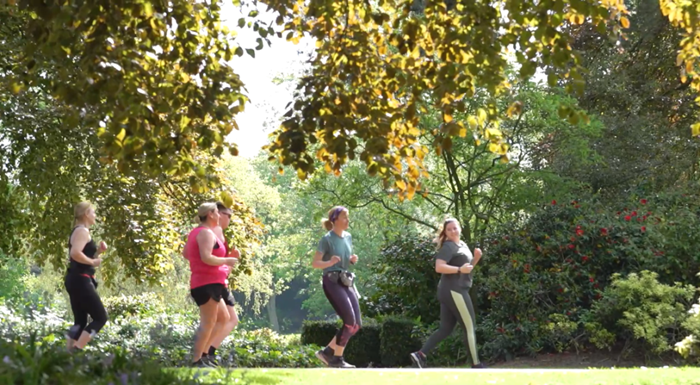 Jolly Joggers group running in a park